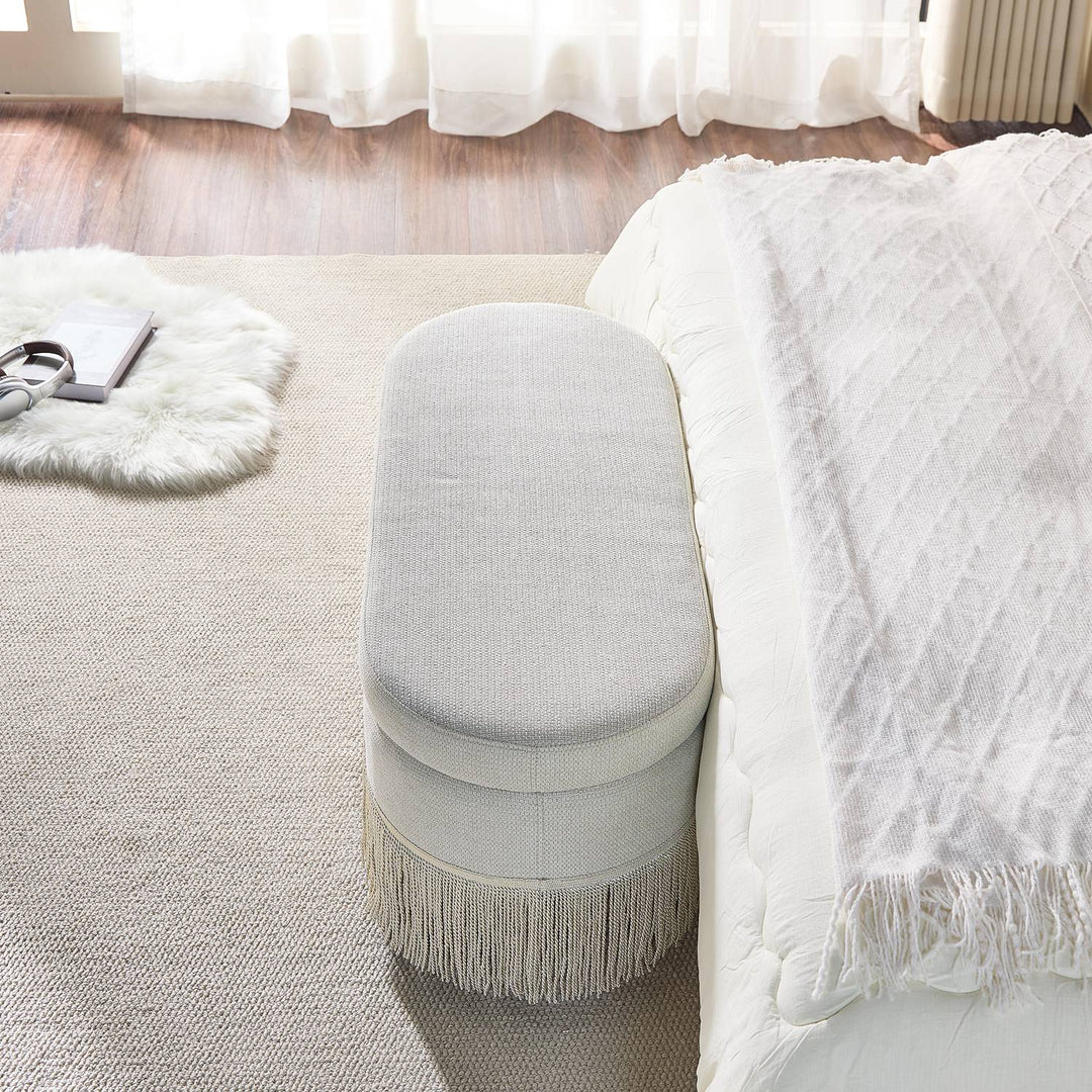 Oval Upholstered Storage Ottoman with Fringe Trim, 39.4"
