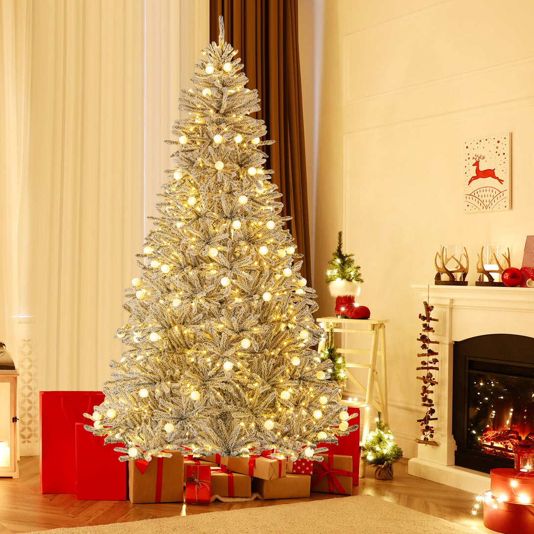 6 Feet Snow-flocked Artificial Christmas Tree Pre-lit Hinged with 81 Sphere Lights and Remote