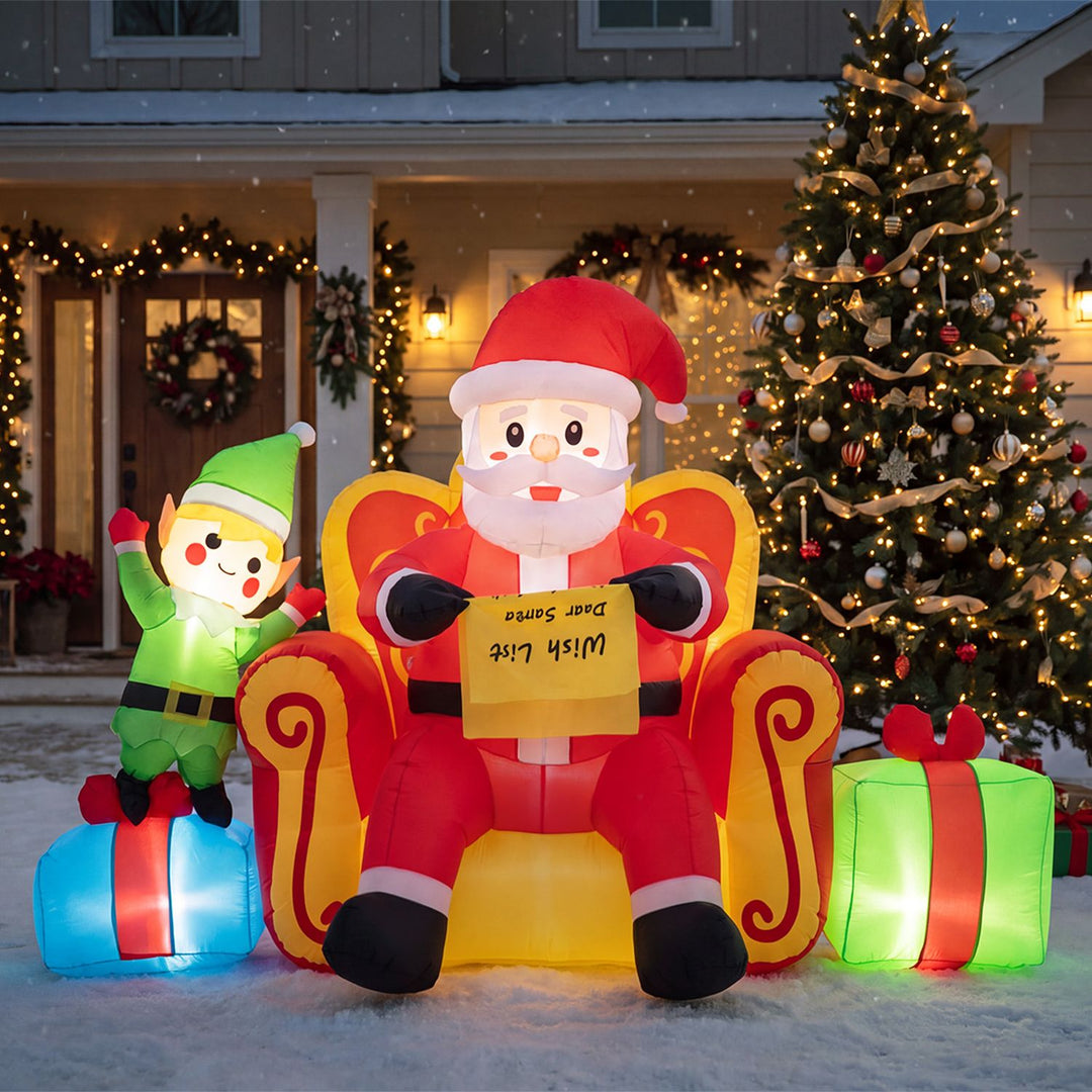 Christmas Inflatable Santa Claus on Sofa with Elf and Gift Boxes