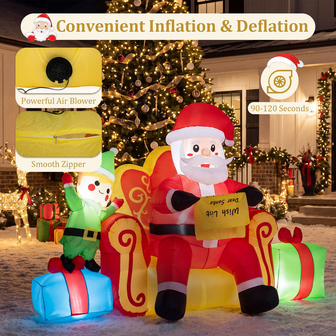 Christmas Inflatable Santa Claus on Sofa with Elf and Gift Boxes