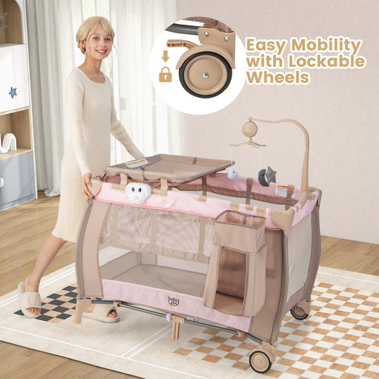 Portable Baby Playard with Changing Table Bassinet and Music Box-Pink