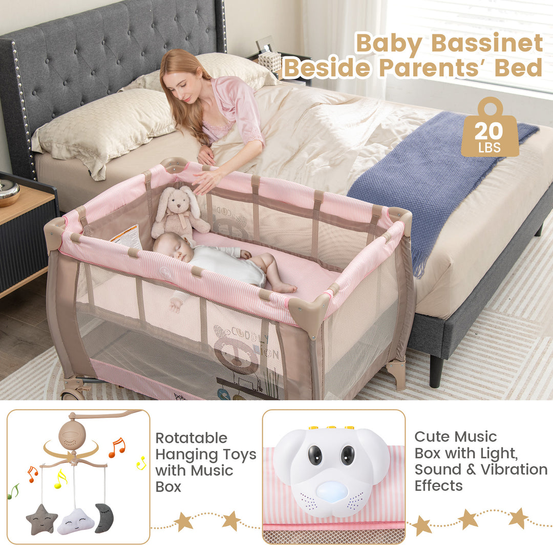 Portable Baby Playard with Changing Table Bassinet and Music Box-Pink