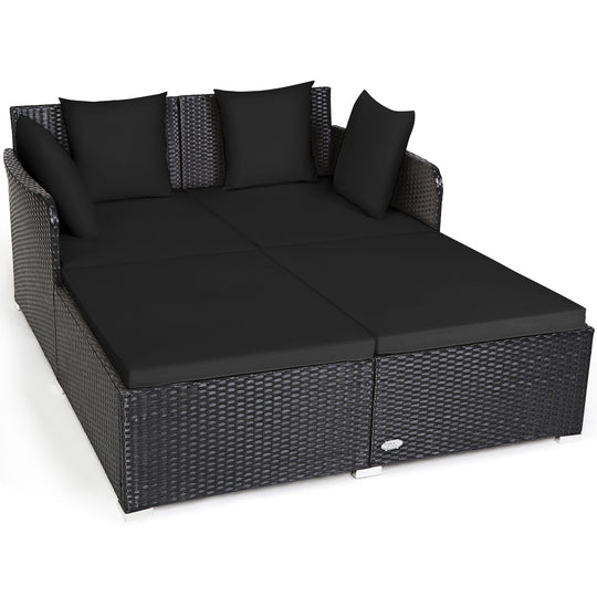 Spacious Outdoor Rattan Daybed with Upholstered Cushions and Pillows