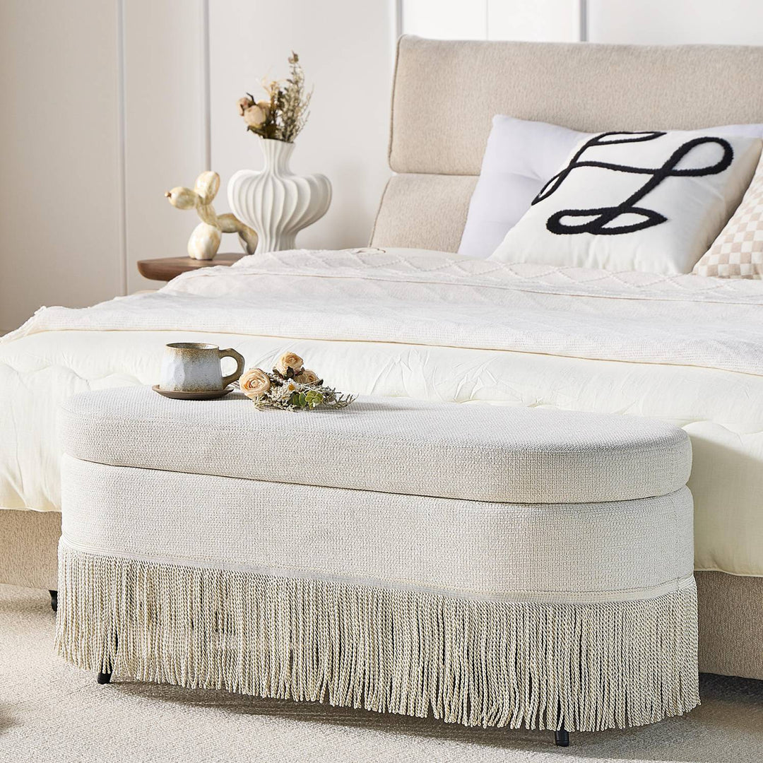 Oval Upholstered Storage Ottoman with Fringe Trim, 39.4"