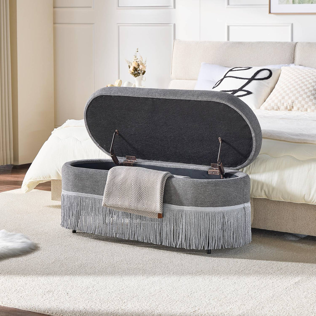 Oval Upholstered Storage Ottoman with Fringe Trim, 39.4"