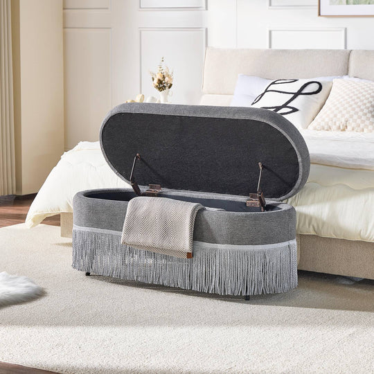 Oval Upholstered Storage Ottoman with Fringe Trim, 39.4"